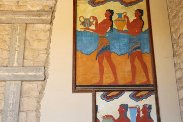 Minoan figures mural painting fresco at archaeological site of Knossos. Minoan Palace , Crete ,Greece