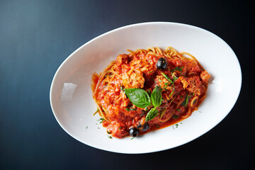 pasta with tomato sauce and basil