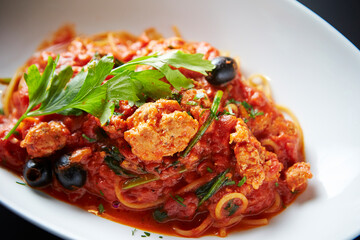 pasta with tomato sauce and basil