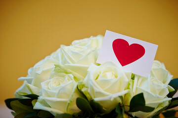 Heart note and wedding bouquet