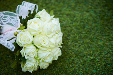 rose wedding bouquet on the grass