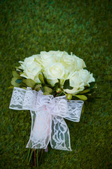rose wedding bouquet on the grass