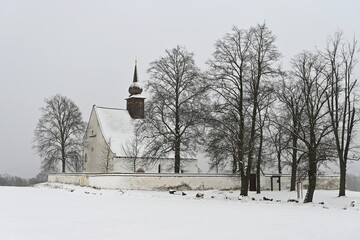 Winter landscape with a beautiful chapel near castle Veveri. Czech Republic city of Brno. The Chapel of the Mother of God.