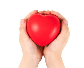 Obraz premium Childâ€™s hands holding red heart on white background.