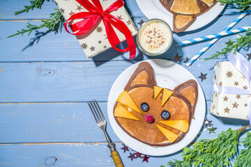 Fototapeta premium Funny New Year 2022 symbols tiger pancakes