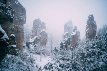 beautiful sandstone rock city in fog
