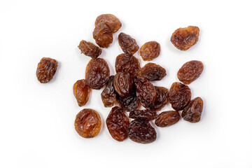 Raisins on white background, dried seedless grapes. Isolated Raisin