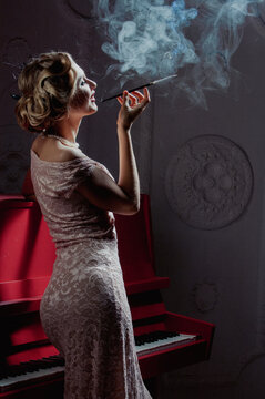 Elegant woman with a cigar..