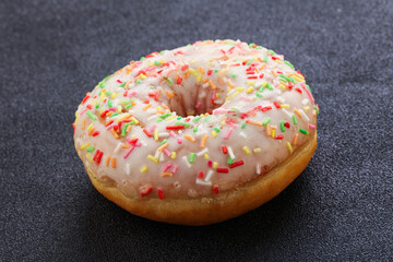 Sweet glazed vanilla donut with icing