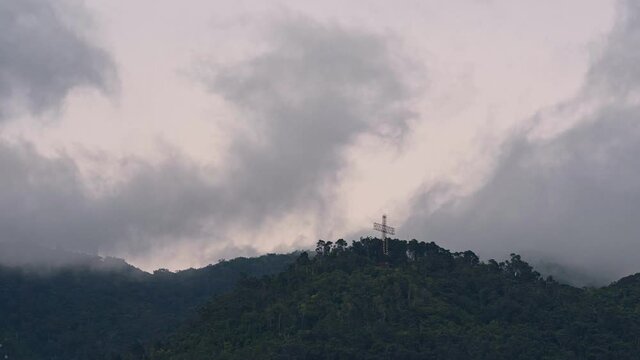 Time-lapse of Humboldt Hotel and the Avila cross at sunset from the east side. Caracas, Venezuela