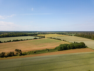 Fototapeta na wymiar Aerial view of a patchwork of farm fields in the Suffolk countryside