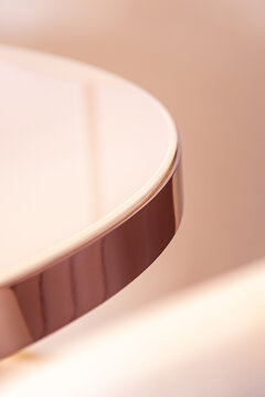 Part of round shaped table with golden rim