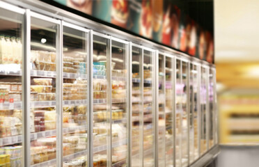 Abstract blurred supermarket aisle .frozen food from a supermarket freezer.