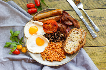 English Breakfast from the top. Eggs, beans, sausages, mushrooms, bacon, tomato and toast.
