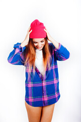 Naklejka premium young pretty stylish hipster girl posing emotional isolated on white background happy smiling cool smile, lifestyle people concept