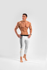 Fototapeta premium Man athlete isolated on white background. Gym full body workout. Muscular man athlete in fitness gym have havy workout. Sports trainer on trainging. Fitness motivation.