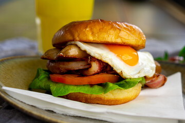Bacon, Sausage and Eggs Breakfast Bun.