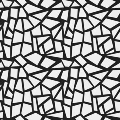 Broken white forms of dried earth or cracked glass. Vector from white shapes and black background.