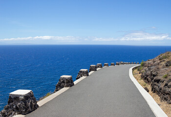 Mountain road next to the ocean