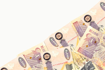 some 100 zambia kwacha bank notes with copyspace on white background