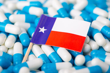 Flag of Texas on pile of pills. Epidemic in the US state concept