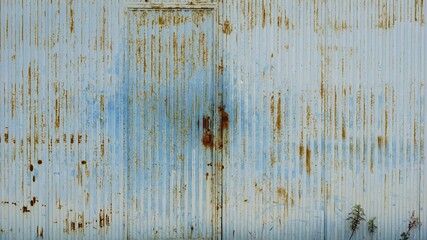 rusty industrial metal door as background