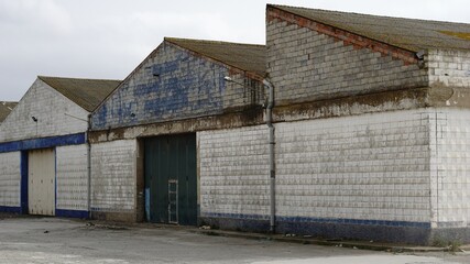 Fototapeta na wymiar abandoned empty industrial building facades