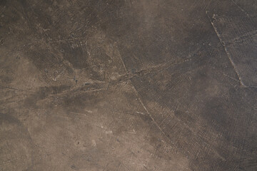 Vintage or rough dark brown background made of natural stone of old texture as a wall with a retro pattern. High quality photo