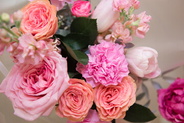 A lot of delicate roses in a bouquet. A festive rose as a gift.