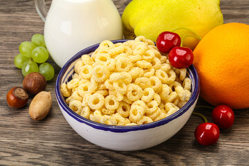 Breakfast with corn rings and milk