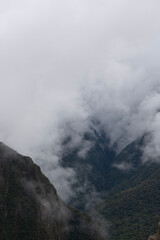 Views of Macchu PIcchu amidst the clouds in Peru