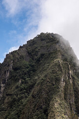 Views of Macchu PIcchu amidst the clouds in Peru