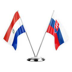 Two table flags isolated on white background 3d illustration, paraguay and slovakia