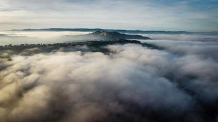 Fototapeta premium Layers of fog color a winter day
