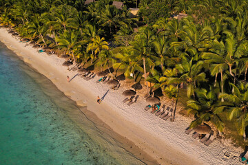 On the beautiful beach of the island of Mauritius along the coast. Shooting from a bird's eye view...
