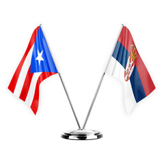 Two table flags isolated on white background 3d illustration, puerto rico and serbia