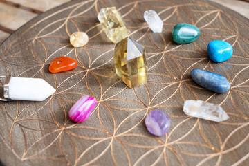 Healing crystals on brown background