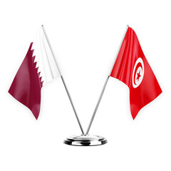 Obraz premium Two table flags isolated on white background 3d illustration, qatar and tunisia