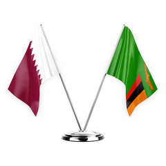 Two table flags isolated on white background 3d illustration, qatar and zambia