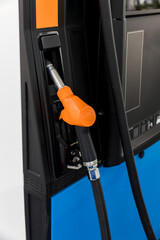 Fuel Pump, Gas Station, Gasoline. Colorful Petrol pump filling nozzles . Gas station in a service...