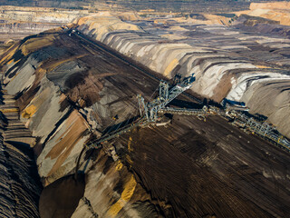 Mining equipment in a brown coal open pit mine near Garzweiler, Germany. Aerial View