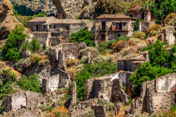 Small village of Pentedattilo, church and ruins of the abandoned village, Greek colony on Mount Calvario, whose form recalls the five fingers. Calabria, Italy