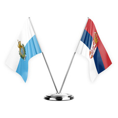 Two table flags isolated on white background 3d illustration, san marino and serbia