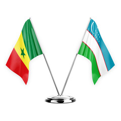 Two table flags isolated on white background 3d illustration, senegal and uzbekistan