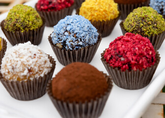 colourful  sweet balls with different tastes on white background	