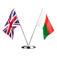 Two table flags isolated on white background 3d illustration, united kingdom and madagascar