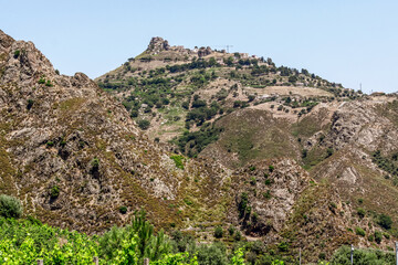 Naklejka premium Wild and picturesque Calabria Amazing scenery of Calabrian hills with roads and olive trees visible from Bova superiore. Calabria, Italy
