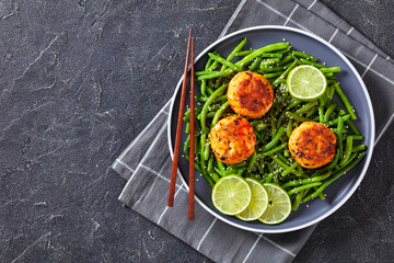 Prawn and Crab Cakes on a plate with green beans