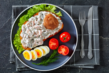 danish smorrebrod with shrimps, mayo, roe, and egg