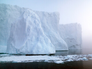Fototapeta na wymiar Icebergs on Arctic Ocean in Greenland. Climate Change on Pole region